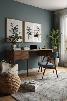 a living room with blue walls and wooden flooring, two framed pictures on the wall