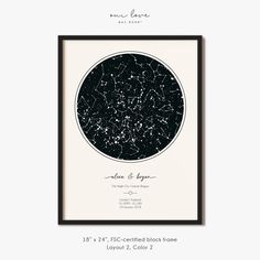 the map of the night sky in black and white, framed on a beige wall