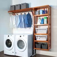 a washer and dryer sitting next to each other in front of a wooden shelf