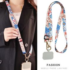 a woman wearing a floral lanyard with a tag on it