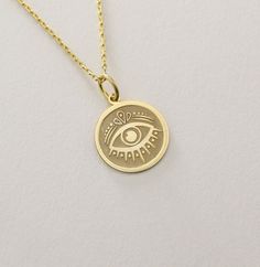 14K Real Solid Gold Evil Eye Pendant ● Material of pendant: Solid Gold 14k ( REAL GOLD ) ● Metal Stamp: 14L ( REAL GOLD ) ● The pendant is available in 6 sizes: - 14,0 mm / 0,55 inches ( Diameter ) In the photos - 15,3 mm / 0.60 inches ( Diameter ) - 16,5 mm / 0,65 inches ( Diameter ) - 19,1 mm / 0,75 inches ( Diameter ) - 21 mm / 0,82 inches ( Diameter ) - 23 mm / 0.90 inches ( Diameter ) ( In the photos the size is 14mm / 0.55 inches Diameter ) ( Jump Ring inner diameter: 4 mm ) ● Material Of Evil Eye Necklace Gold, Jewelry Personalized, Eye Pendant, Evil Eye Pendant, Evil Eye Charm, Evil Eye Necklace, Eye Necklace, Gold Charm, Jump Rings