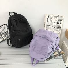 Size:length 32cm,Width 13cm,Height 34cm Color:black/green/purple/khaki Purple Large Capacity Backpack For School, Large Capacity Purple Backpack For School, Harajuku School Bags With Pockets, Kawaii School Bag With Pockets, Trendy Back To School Bag, Black Harajuku Style Everyday Backpack, Trendy Student Satchel Backpack, Casual Satchel Backpack For Students, Casual Student Satchel Backpack