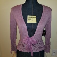 #547 Nwt Nicole By Nicole Miller Purple Knit Eyelet Bow Cardigan S Not Lined Sequins. All Of My Items Are From Smoke And Other Smells Free Environment. Measurements Are In The Pictures. All Reasonable Offers Will Be Considered. Dummy That The Item(S) Is Displayed On Approximated Measurements (Around = Circumferences). Bust 34.25" Waist 26" Hips (Bottom Of The Dummy) 35.25" 23" Long (From The Nape Of The Neck To The Bottom) Contents And Details As Pictured. All Measurements Are Approximate. Chic Fitted Purple Cardigan, Elegant Purple Sweater For Spring, Elegant Spring Purple Sweater, Spring Fitted Purple Cardigan, Purple Fitted Cardigan For Spring, Purple Fitted Cardigan For Fall, Fitted Purple Cardigan For Spring, Fitted Purple Cardigan For Fall, Elegant Purple Fall Cardigan