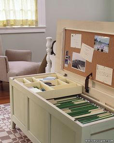 an open drawer with some papers in it