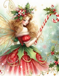 a christmas fairy holding a candy cane