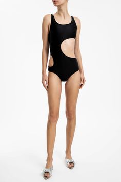 DescriptionThis swimsuit can be worn with a cover up and vintage sunglasses, during the day by the pool. Product detailsSolid, Cut-Out ColorBlack Composition85% POLYAMIDE 15% SPANDEX Model measurementsHeight: 180 cm (5'11") / Bust: 82 cm (32.3") / Waist: 60 cm (23.6") / Hips: 92 cm (36.2") - Model is wearing size small. SKU: MAAL0201R23 Chic Black Swimwear For Beach, Black Summer Swimwear With Uv Protection, Modern Swimwear For Summer Pool, Modern Summer Bodysuit, Black Uv Protection Summer Swimwear, Chic Black Swimwear For Pool, Chic Black Pool Swimwear, Modern One-piece Swimwear For Pool, Black Swimwear With Uv Protection For The Beach