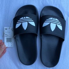 Brand New With Box Questions? Leave A Comment Below! Casual Black Flip Flops For Streetwear, Adidas Black Slides For Summer, Adidas Black Slides With Logo, Black Adidas Logo Sandals, Non-slip Black Flip Flops For Streetwear, Black Non-slip Flip Flops For Streetwear, Summer Black Adidas Sandals, Adidas Non-slip Slides With Round Toe, Adidas Non-slip Sandals For Streetwear