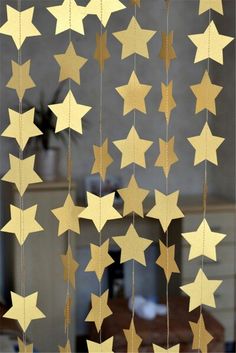 some gold stars hanging from the ceiling