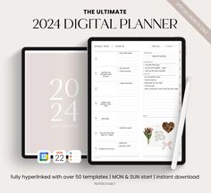 the ultimate digital planner is displayed on an ipad with flowers and hearts in front of it