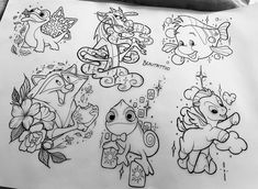 several drawings of different animals and flowers on a piece of paper with writing underneath them