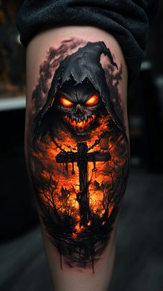 a man's leg with a tattoo on it that has an image of a cross and