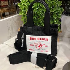 True Religion Black Denim Mini Tote With Detachable Crossbody Strap Perfect For Travel And On The Go Casual Black Denim Bag, Black Trendy Denim Bag, Trendy Black Denim Bag, True Religion Purse, True Religion Bag, Black Duffle Bag, Marc Jacobs Purse, My Style Bags, Birthday Fits