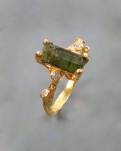 Boho chic statement ring with natural raw green tourmaline in a long bar shape. Stunning and bold, just as you are! :) ♥ The design can be made with gemstones of your choosing ♥ Each order will be gift wrapped beautifully �♥ QUALITY: Each item is stamped according to US regulations.  ➤ Orders of $550 and more will be qualified for free UPS International Express shipping (2-3 days). ------   *DIMENSIONS*  ------ ♥ Ring Size: 7.5 US. All other sizes will be made to order Main Metal: 925 Sterling Si Luxury Green Crystal Ring For Gift, Gold Goth, Rough Gemstone Ring, Raw Crystal Ring, Chic Rings, Raw Stone Ring, Bar Ring, Tourmaline Ring, Shiny Things