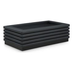 four black plastic trays stacked on top of each other