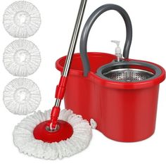 the mop is red and has three cleaning pads on it