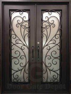 an ornate iron door with glass panels on the front and side doors, in dark wood