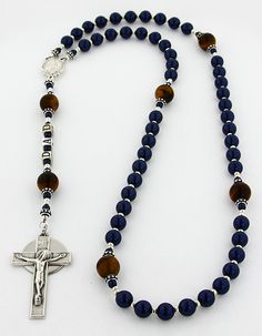 "This men's rosary is a personalized rosary that is sure to make Dad smile on Father's Day. It comes with the block letters \"DAD\" between the crucifix and centerpiece and it is available with or without an Engraved Disc. It comes with your choice of a gift message that is elegantly boxed for simple gift giving. This masculine rosary has large Swarovski Pearls and Tiger Eye beads that are the perfect size for dad's hands. This is Not A Necklace. Add an Engraved Disc - Select a Disc option. - Se Christian Rosary, Mens Rosary Necklace, Mens Rosary, Mini Rosaries, Rosary Style Necklace, Personalized Rosary, Iphone Wallpaper For Guys, Antique Picture Frames, Friendship And Dating