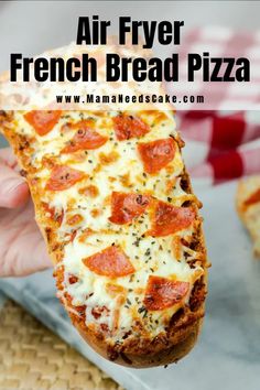 a person holding up a piece of bread with cheese and pepperoni on it in front of the words air fryer french bread pizza