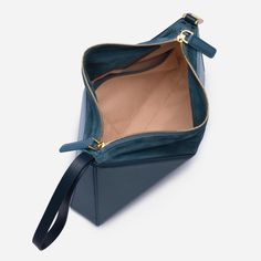 Our architectural, origami inspired shoulder bag, now has a new dimension. It can be converted into a wrist bag just with a quick move. The shoulder strap can easily be removed, so you can slung it from your wrist or use as a clutch. It has plenty of room inside for your essentials including a large phone, small wallet, and 300 ml water bottle. Made from smooth leather and has a suede top with two-way zip fastening. Interior features two slip pockets. Crafted from smooth calf leather. Canvas lin Architectural Origami, Wrist Bag, Leather Bag Pattern, Suede Top, Suede Tops, New Dimension, Secret Sale, New Launch, Small Wallet