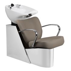 a chair that has a sink on it and is in the shape of a reclining chair