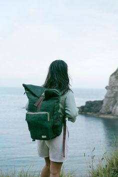 "Sustainable Hemp Backpack made of Natural Fibre We hope Yatra Backpack will accompany you on all your adventures, be it for your daily use to school or work, or for somewhere a little far away. We hope, together, you will embark on the \"Yatra\" of life- learning, growing, wandering, and accompanying one another, making new memories, and much much more. The backpack has a single compartment with three interior pockets including a padded slot that can house Laptops of up to 15.5\" screen. It has Large Capacity Green Canvas Backpack, Practical Green Backpack For Adventure, Green Backpack For Outdoor Activities With Large Capacity, Practical Outdoor Backpack, Large Capacity Green Backpack For Travel, Green Large Capacity Travel Backpack, Large Capacity Green Travel Backpack, Practical Backpack With Adjustable Strap For Adventure, Practical Adventure Backpack With Adjustable Strap