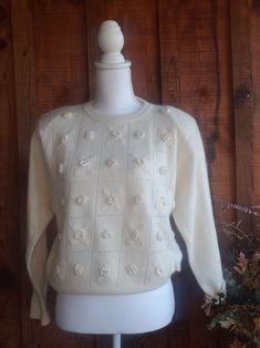 Vintage 1950s Japanese nylon knit Sweater with floral embellishments  Size Medium Excellent condition, almost mint small shoulder pads Need to wear a cami under it as it has open stitching as part of the design Vintage Cream Sweater With Floral Embroidery, Fitted Cream Sweater With Floral Embroidery, 1950s Sweater, American Advertising, Vintage Newspaper, Pullover Outfit, Womens Sweaters, Yellow Polka Dot, Sweater Fits