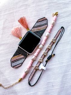 - Apple Watch Band compatible con iWatch series 3,4,5,6,7. - Available only in size 42-45mm - Fits all wrists. - You can buy separate or the whole bracelets set. - Bundle sets includes 1 watch strap, 1 pale pink pearls bracelet and 1 Crystal Miyuki Bracelet - Apple Watch not included. Trendy Beaded Apple Watch Band As Fashion Accessory, Trendy Beaded Apple Watch Band, Trendy Adjustable Beaded Apple Watch Band, Pink Apple Watch Band With Bracelet Strap, Bohemian Watch Bands With Bracelet Strap, Trendy Pink Bracelet Strap Apple Watch Band, Bohemian Adjustable Apple Watch Band With Round Beads, Trendy Handmade Adjustable Watch Band, Adjustable Beaded Bohemian Watch Bands