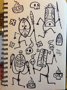 a notebook with some drawings on it