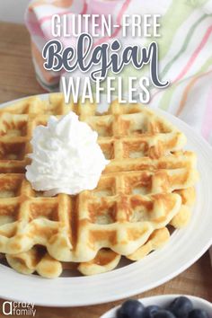 gluten - free belgium waffles with whipped cream and blueberries on the side