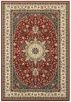 a red and black rug with an ornate design on the center, surrounded by smaller flowers