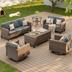 an outdoor living area with wicker furniture