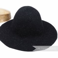 This wool felt capeline hat body is made from 100% thick Australian wool and has been stiffened to help in the hat blocking process. Even better, it has been dashed with ivory hare fur strands to make for a luxurious confetti effect. Great for making fascinators and hats from scratch the traditional way. Capeline Measures approx.: 2.5-3mm thick Flat measurement 28x46cm (11x18.1 inches) Weight: 120g Brim width from side crown to brim edge: 8-10cm (3.1-3.9 inches) Stiffener: 1 degree shellac stiff Winter Wool Cloche Felt Hat, Winter Wool Cloche Hat, Winter Wool Top Hat With Flat Brim, Winter Felt Hat With Curved Brim, Winter Fur Felt Hat, Black Fur Felt Hat With Curved Brim, Black Wool Hat With Curved Brim, Wool Wide Brim Top Hat For Winter, Winter Wide Brim Fur Felt Hat