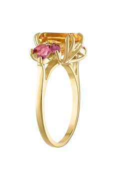 Vibrant marquise-cut pink topaz frames a cushion-cut citrine stone centered on a gleaming 10-karat gold ring. 10k gold/citrine/pink topaz Imported Extravagant Dresses, Pink Topaz Ring, Pink Sapphire Ring, Pink Topaz, Citrine Ring, Citrine Stone, Size 10 Rings, Marquise Cut, Topaz Ring