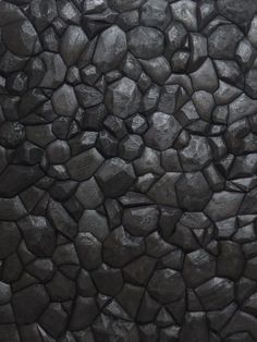 the texture of rocks is black and gray