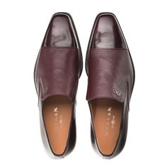 Style: Milani-Burgundy Updated Classic Dress slip-on Shoe from the Mezlan collection in a combination of Supple Deerskin & High Shine Italian Calfskin! Features soft Calfskin lining, their injected comfort insole, their Signature Mezlan Icon, and a full Leather Sole! Handmade in Spain. Elegant Burgundy Leather Shoes For Galas, Elegant Burgundy Dress Shoes With Leather Lining, Elegant Burgundy Leather Slip-on Shoes, Elegant Burgundy Leather Shoes For Formal Occasions, Elegant Burgundy Slip-on Leather Shoes, Elegant Burgundy Dress Shoes For Galas, Elegant Burgundy Leather Shoes For Semi-formal Occasions, Luxury Burgundy Loafers For Formal Occasions, Elegant Fitted Slip-ons With Leather Sole