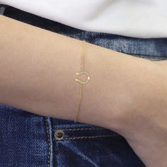 A darling 14k gold horseshoe showcases 14 tiny and sparkling diamonds ,The diamond cut cable chain makes it to pair with almost anything This stylish gold diamond horseshoe bracelet is a fabulous addition to a lucky lady's fashion jewelry collection. Features: * Made to Order. * Gold Kt: 14K * Custom Gold Color: Rose Gold, Yellow Gold, White Gold * Round Diamond: 14 pc 1.00 MM * Total CTW: 0.070 * Diamond Color-Clarity: G Color SI Clarity * Length& Width: 10.00 x 10.00 MM * Setting Type: mic Dainty Horseshoe Jewelry As A Gift, Dainty Horseshoe-shaped Jewelry Gift, Dainty Horseshoe Jewelry For Gifts, Horseshoe Shaped Yellow Gold Jewelry Gift, Horseshoe-shaped Yellow Gold Jewelry Gift, Stackable Diamond Bands, Diamond Symbol, Horseshoe Bracelet, Flawless Diamond