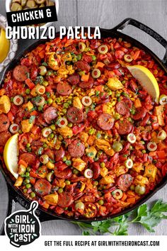 a large skillet filled with different types of food