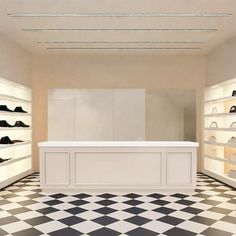 an empty shoe store with black and white checkered floor