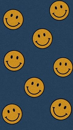 many yellow smiley faces on a blue background