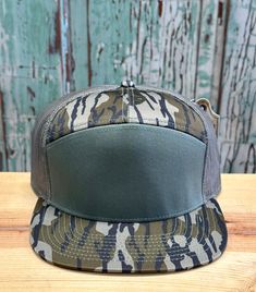 Richardson 168 7 Panel Trucker Hat Bottomland/Loden Blank Awesome custom camo color on a top quality Richardson hat!  Stand out from the crowd. Richardson 168 brand hat Richardson 112 College Hats, Military Style Baseball Cap With Flat Brim, Green Military Hat With Curved Brim, Military Style Snapback Hat With Flat Brim, Khaki Military Hat For Hunting, Flat Bill Snapback Hat For Camping, Military Style Khaki Hunting Hat, Khaki Military Style Hunting Hats, Military Style Khaki Trucker Hat