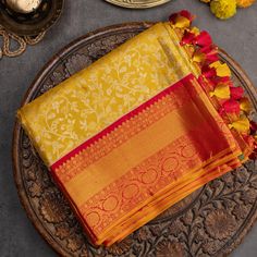 Yellow Kanchi jamdani Best Quality Zari Handwoven Saree with Orange red Borders Exclusive | SILK MARK CERTIFIED is a mesmerizing ode to natural beauty and artistic finesse. Its  pattern, delicately woven, evokes the serene majesty of bright landscapes. Enhanced by contrasting  Orange red borders, the saree exudes a striking allure, balancing subtlety with vibrancy.  Material Gadwal silk Size 6.2 m x 1.14 m Craft Gadwal handloom Telangana Ready to wear with fall and pico done.  Handmade Designer silk tassels adorn the pallu  SILK MARK CERTIFIED Blouse - Unstitched SAREE Craft : Handwoven Pattern : All over Purity : Pure Saree Color : Yellow Saree Fabric : Fabric Silk Saree length : 5.5 Mtrs Saree Work : Woven BORDER/PALLU Saree Border Color : Orange red Saree Border Fabric :Silk Saree Borde Festive Red Saree With Woven Motifs, Traditional Wear With Woven Motifs For Diwali, Red Traditional Wear With Woven Motifs For Diwali, Traditional Wear With Woven Motifs For Diwali Festive, Festive Traditional Wear With Woven Motifs For Puja, Festive Traditional Wear With Woven Motifs For Diwali, Diwali Festive Traditional Wear With Woven Motifs, Festive Red Traditional Wear With Woven Motifs, Yellow Saree With Woven Motifs For Puja