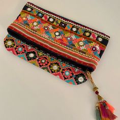 New Without Tags Starmela Navy Cotton Embroidered Clutch. Beautiful Vibrant Colors, Top Zip Closure With Detailed Tassel, Two Inside Pockets, Fold Over Double Snap Closure. 12” Wide X 13” Full Length Flat Or 8” Folded Length Embroidered Clutch Bag, Boho Clutch, Oversized Clutch, Embroidered Clutch, Linen Romper, Black Clutch, Envelope Clutch, Clutch Pouch, Printed Envelopes