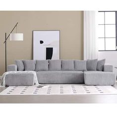 a living room scene with focus on the sectional