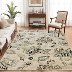 a living room with two chairs and a rug