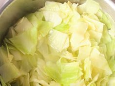 chopped cabbage in a pot on the stove