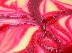 red and white swirled food with water drops on it