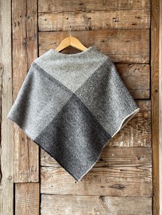 Grey wool poncho large check Lambswool ladies poncho cape Pure wool blanket poncho in check Grey lambswool ponchos Wool poncho cape checked One size fits fashionably for most everyone, short or tall, big or small. This piece is versatile for both Men's & Women's outdoor fashion, and can be used insider in cooler winter weather to keep warm while reading on the couch. CARE: Hand-wash and hang to dry, light iron if needed, or dry clean. MEASURES: Length at the front of the neckline to the bottom i Womens Outdoor Fashion, Blanket Poncho, Ladies Poncho, Wool Poncho, Outdoor Fashion, Poncho Cape, Harris Tweed, Winter Weather, Wool Blanket