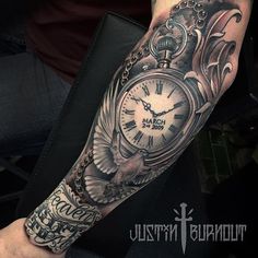 a man with a clock tattoo on his arm