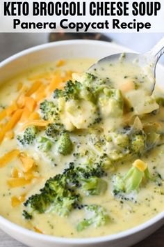 broccoli cheese soup in a white bowl with a spoon