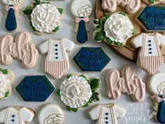 some decorated cookies are sitting on a table